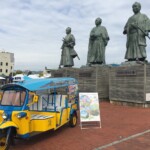 三志士像の前でツノトゥクをPR